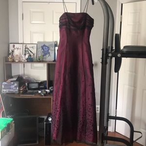 This beautiful dress was worn once.